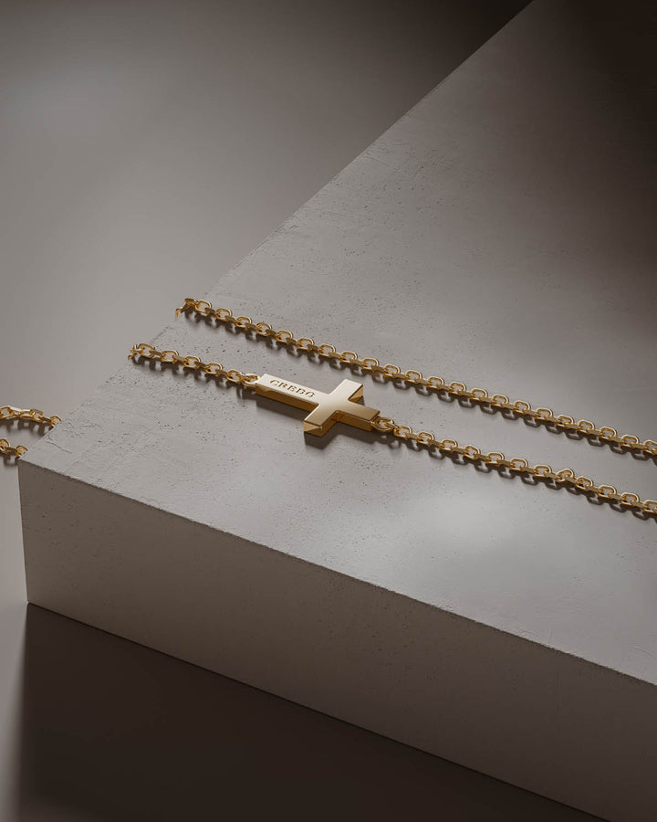 Side cross necklace in gold, second view