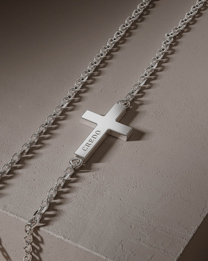 Silver side cross with CREDO engraving, close-up