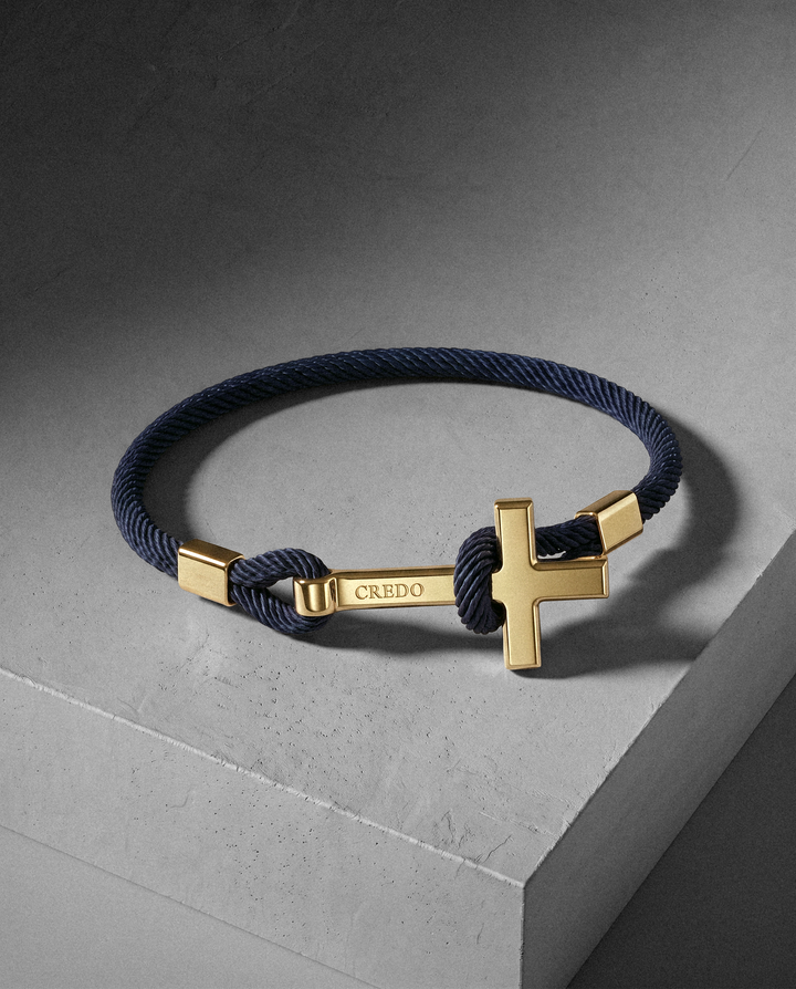 Men's Rope Cross Bracelet in navy blue with a gold cross