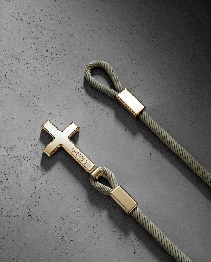 Women's Rope Cross Bracelet in khaki with a gold cross, second view