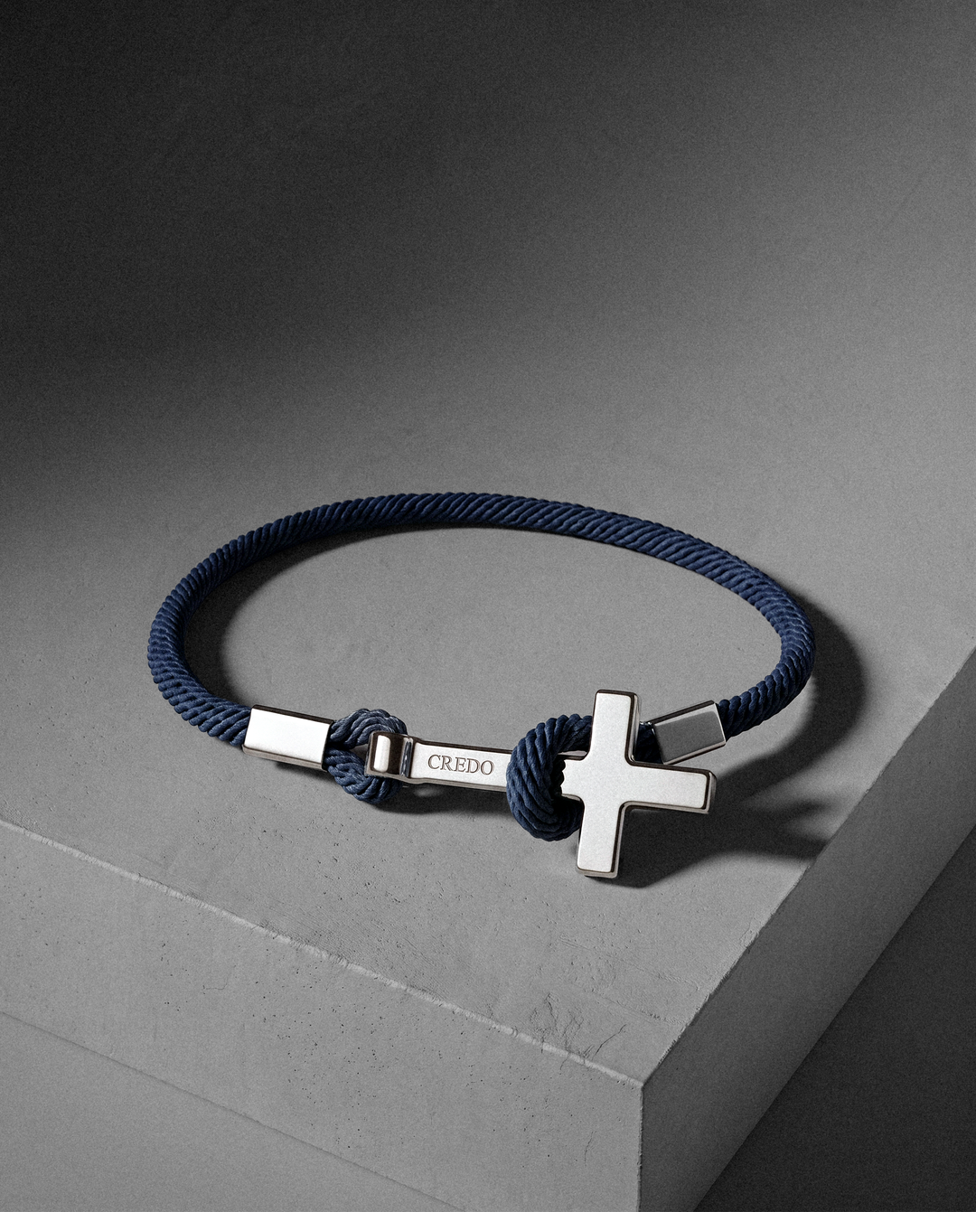 Women's Rope Cross Bracelet in navy blue with a silver cross