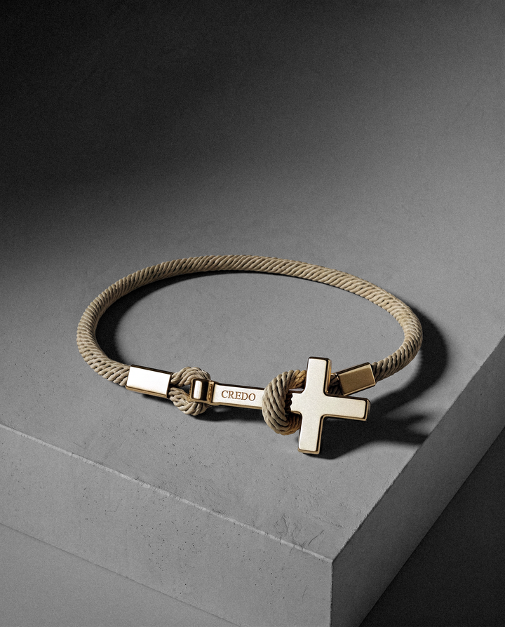 Women's Rope Cross Bracelet in khaki with a gold cross