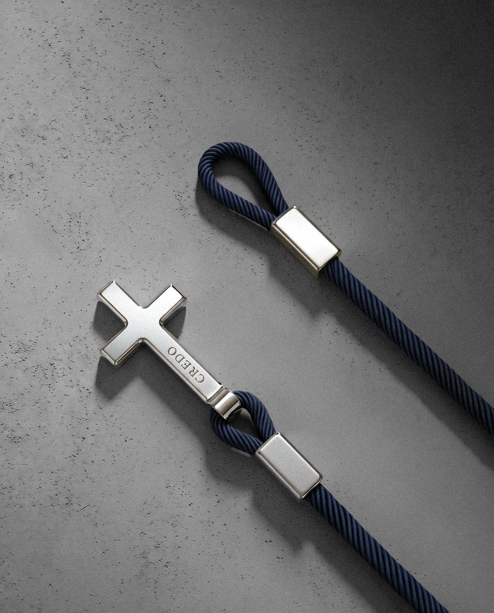 Women's Rope Cross Bracelet in navy blue with a silver cross, second view