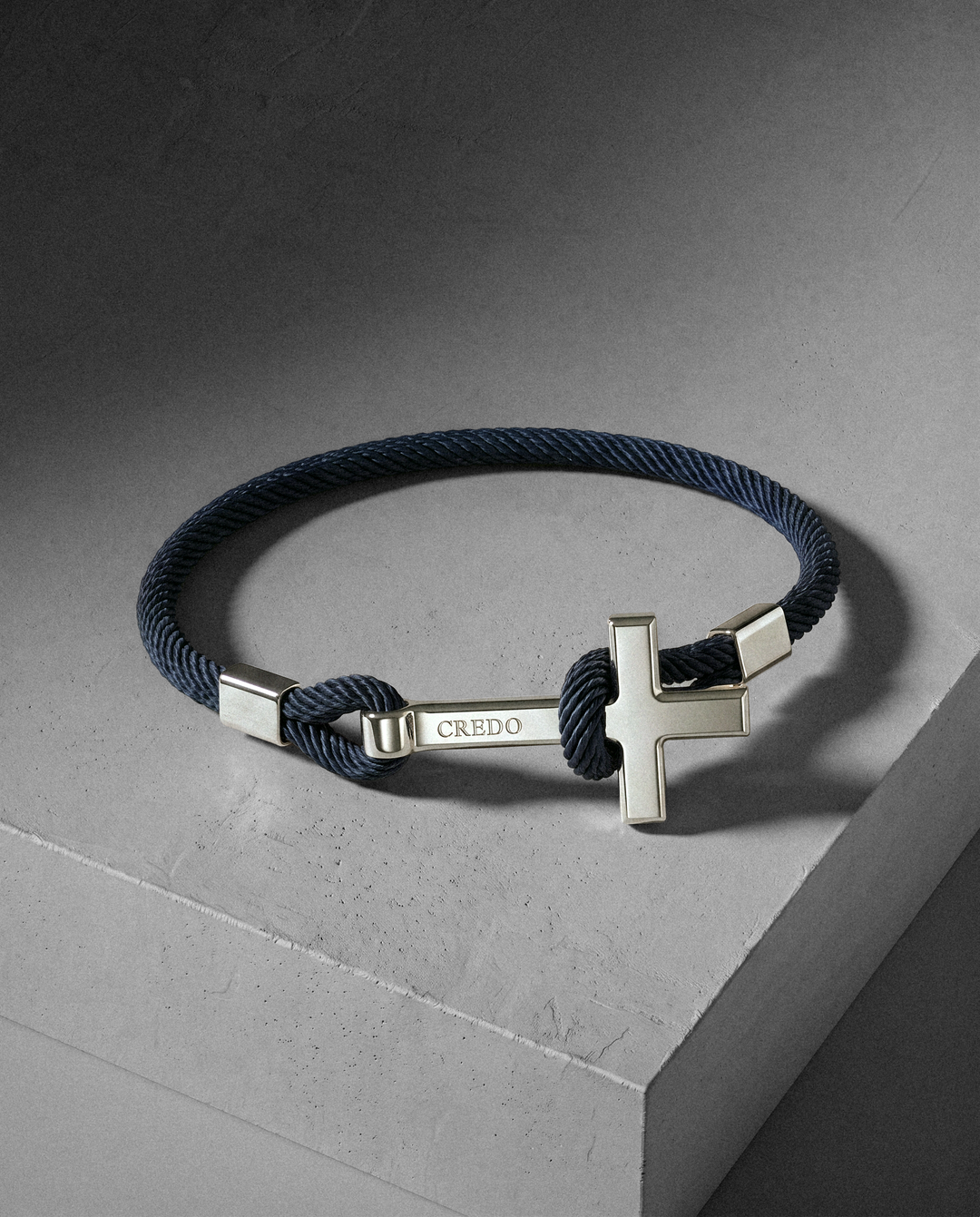 Men's Rope Cross Bracelet in navy blue with a silver cross