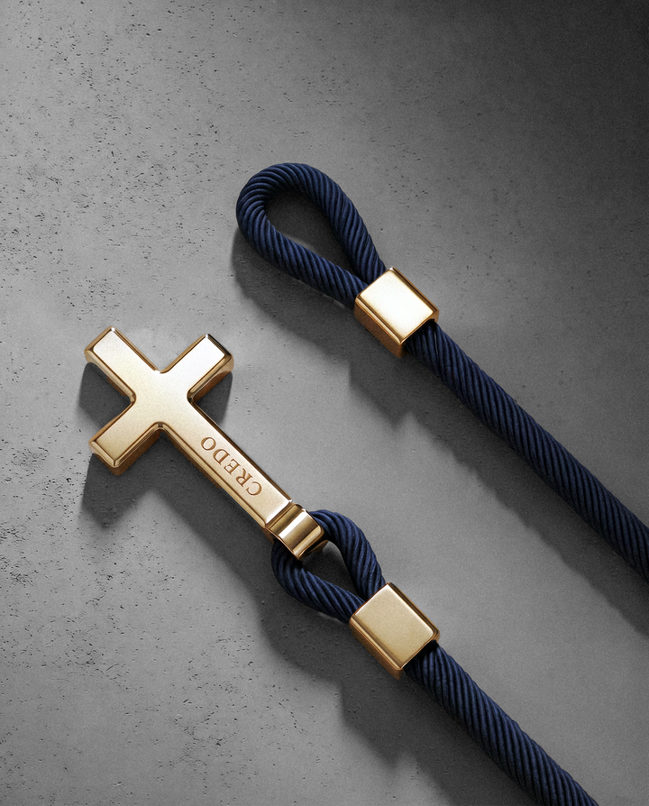 Men's Rope Cross Bracelet in navy blue with a gold cross, second view